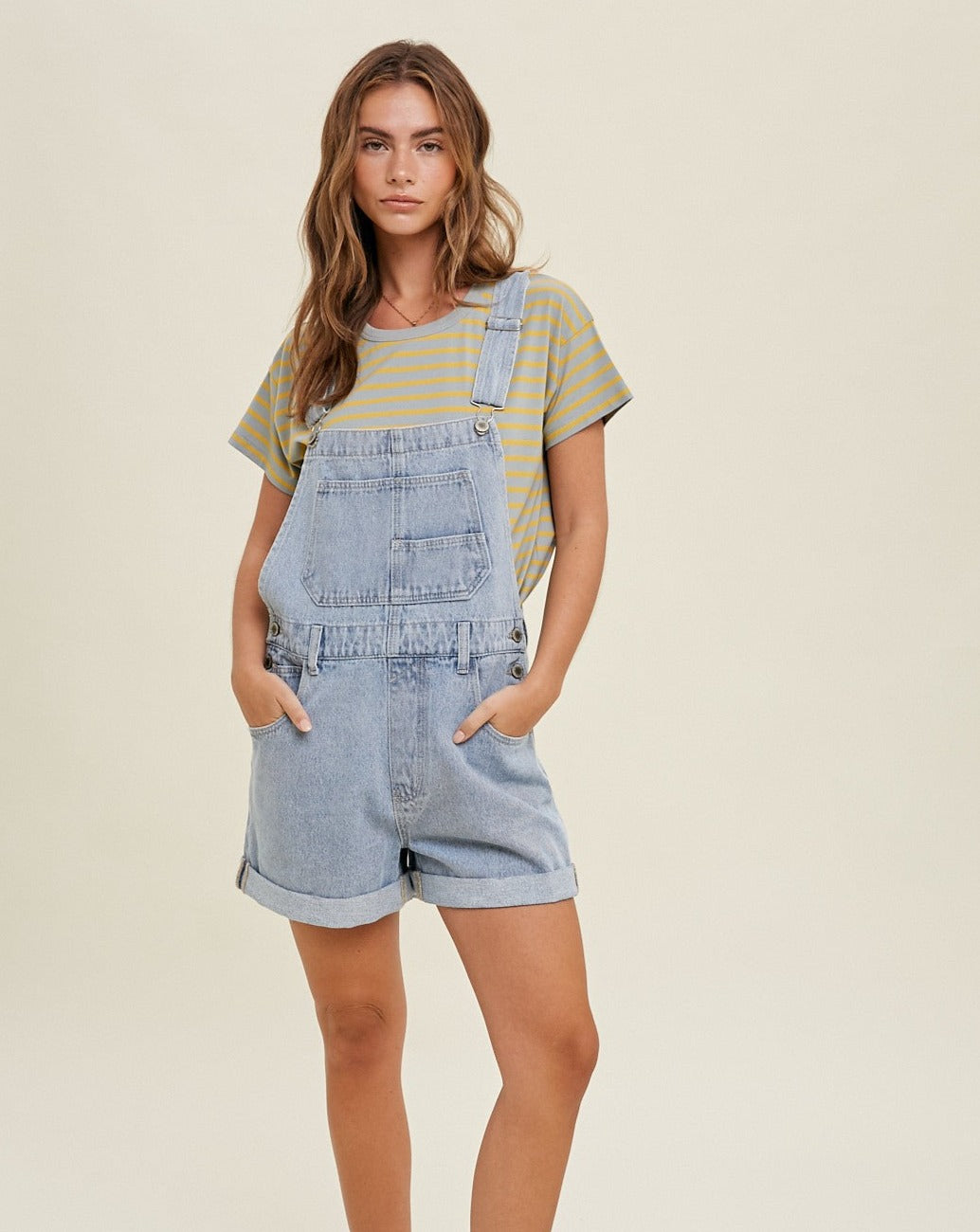 Our Cuffed Denim Shortall is the perfect combination of comfort and style. Featuring a slouchy fit and a cuffed hem, this denim overall is a great addition to any wardrobe.