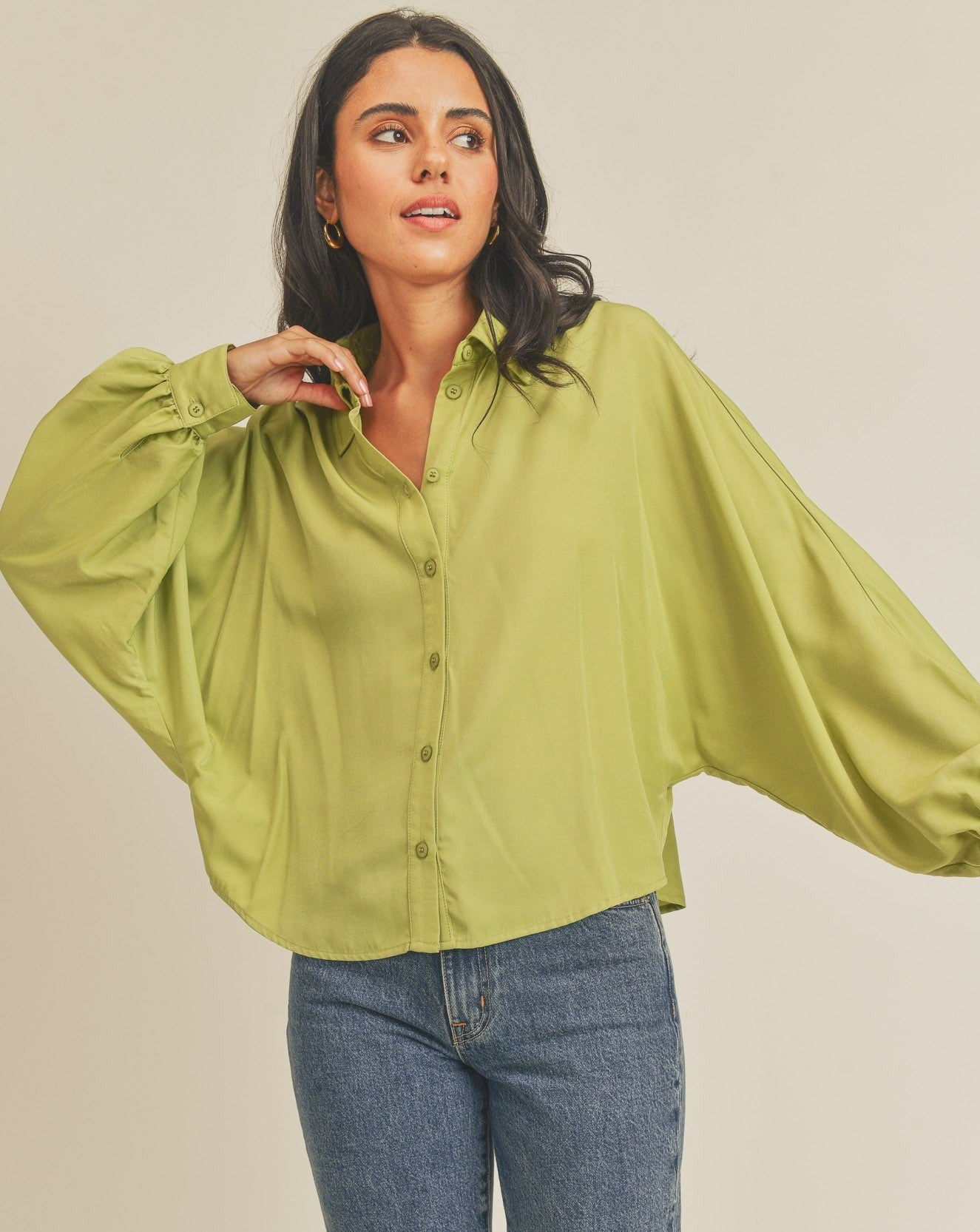 Look effortlessly stylish in our Dolman Sleeve Blouse. This blouse is designed with a Dolman sleeve, so you can create a fashionable and flattering silhouette. It's perfect for casual days or nights out.