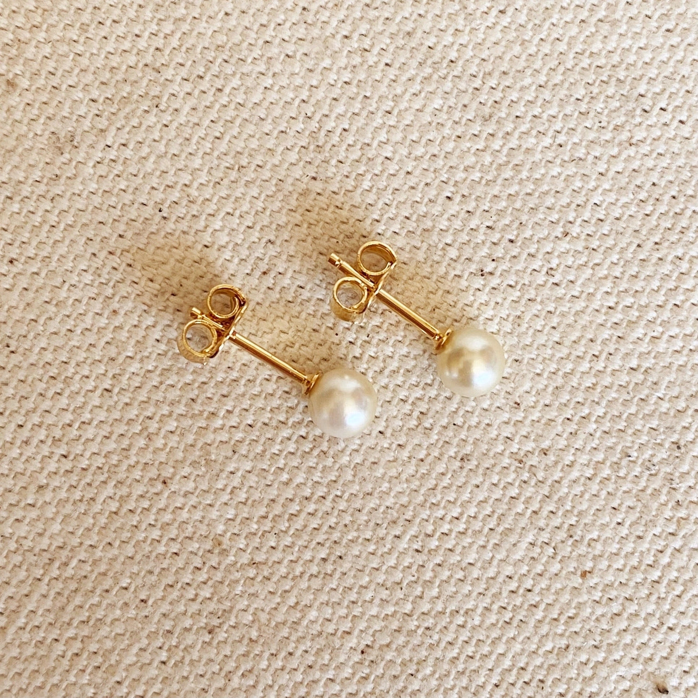 A classic staple that will never go out of style. Our Pearl Stud Earrings are elegant for a night out and simple enough for everyday wear. 